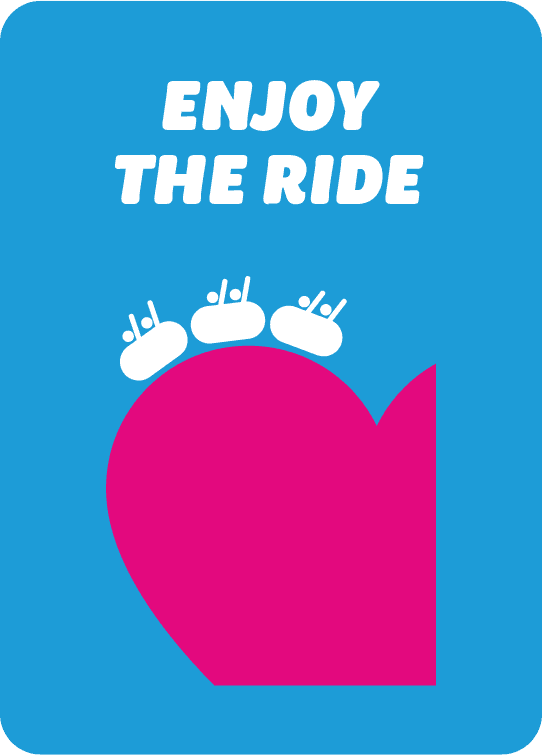 Light blue value card titled 'Enjoy The Ride'. Below the title is a large cropped pink heart with white rollercoaster icons riding along the top.