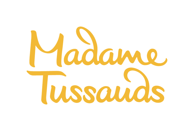 Gold cursive text reads Madame Tussauds.